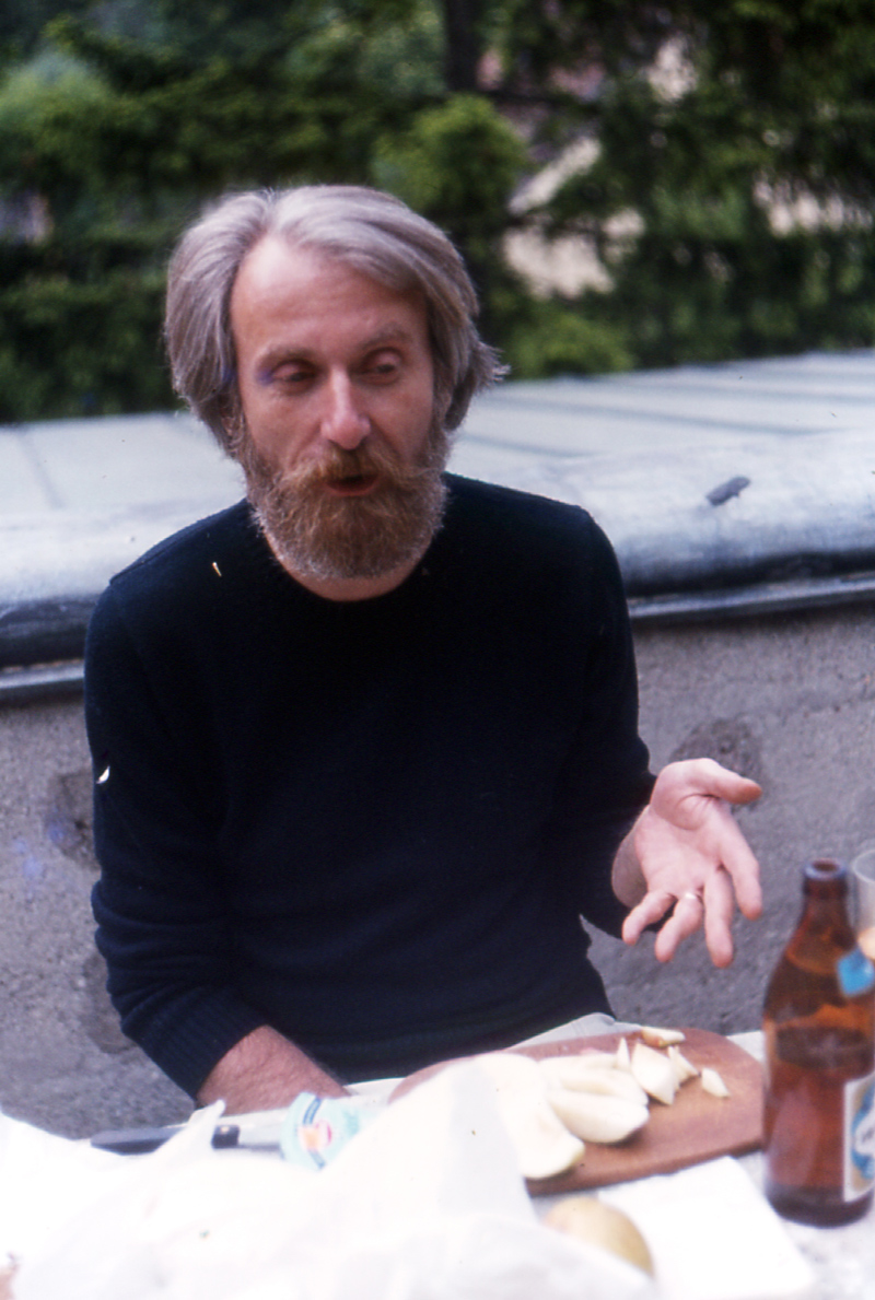 Hans Praetterhoffer seated outdoors at a table